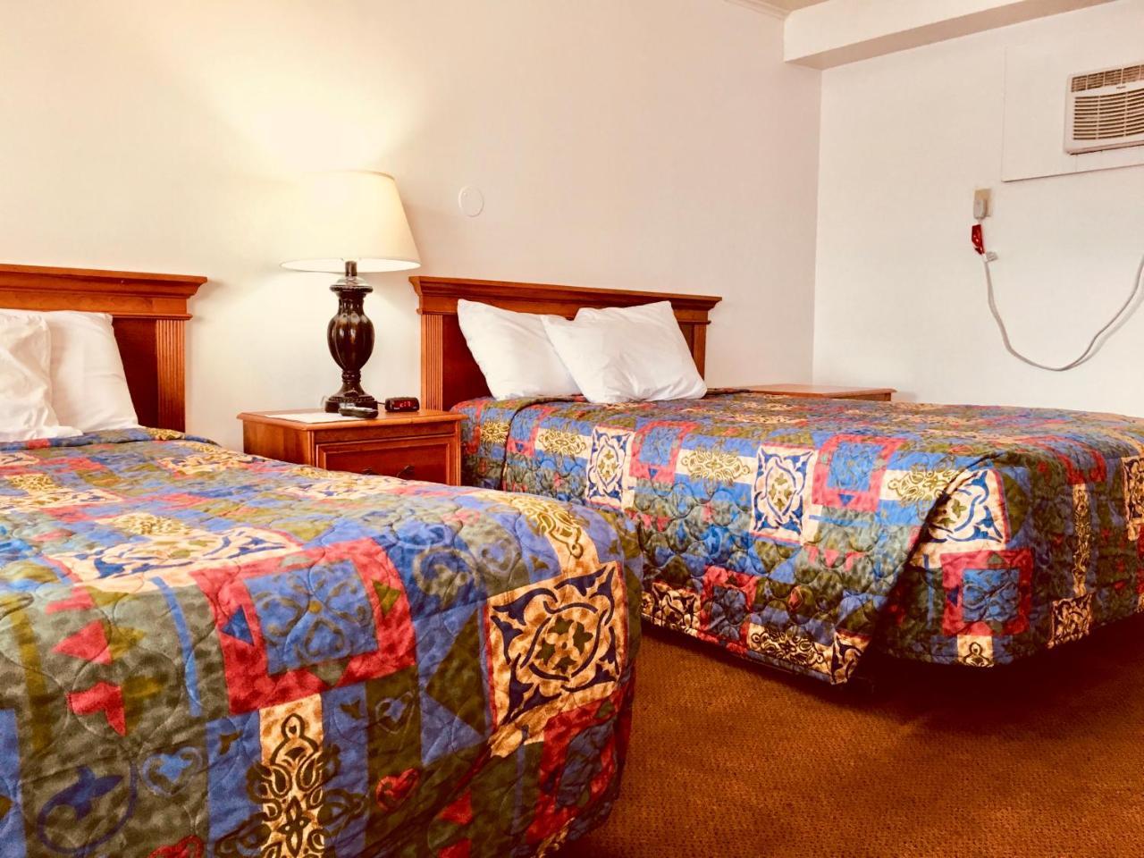 North Country American Inn Калкаска Екстериор снимка